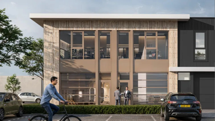 Kopgevel met veel glas en zichtbare entree van een bedrijfsunit.